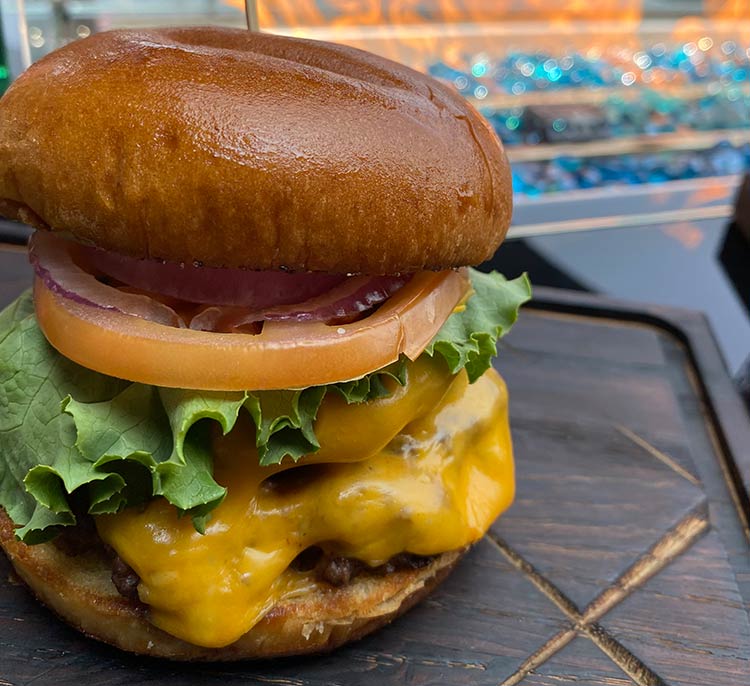 Stoneyard Grill, cheeseburger with lettuce, tomato on bun